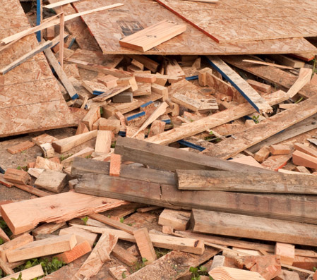 Photo of pile of scrap wood at construction site.