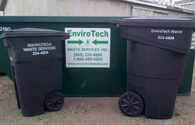 Photo of Envirotech residential and commercial dumpsters.
